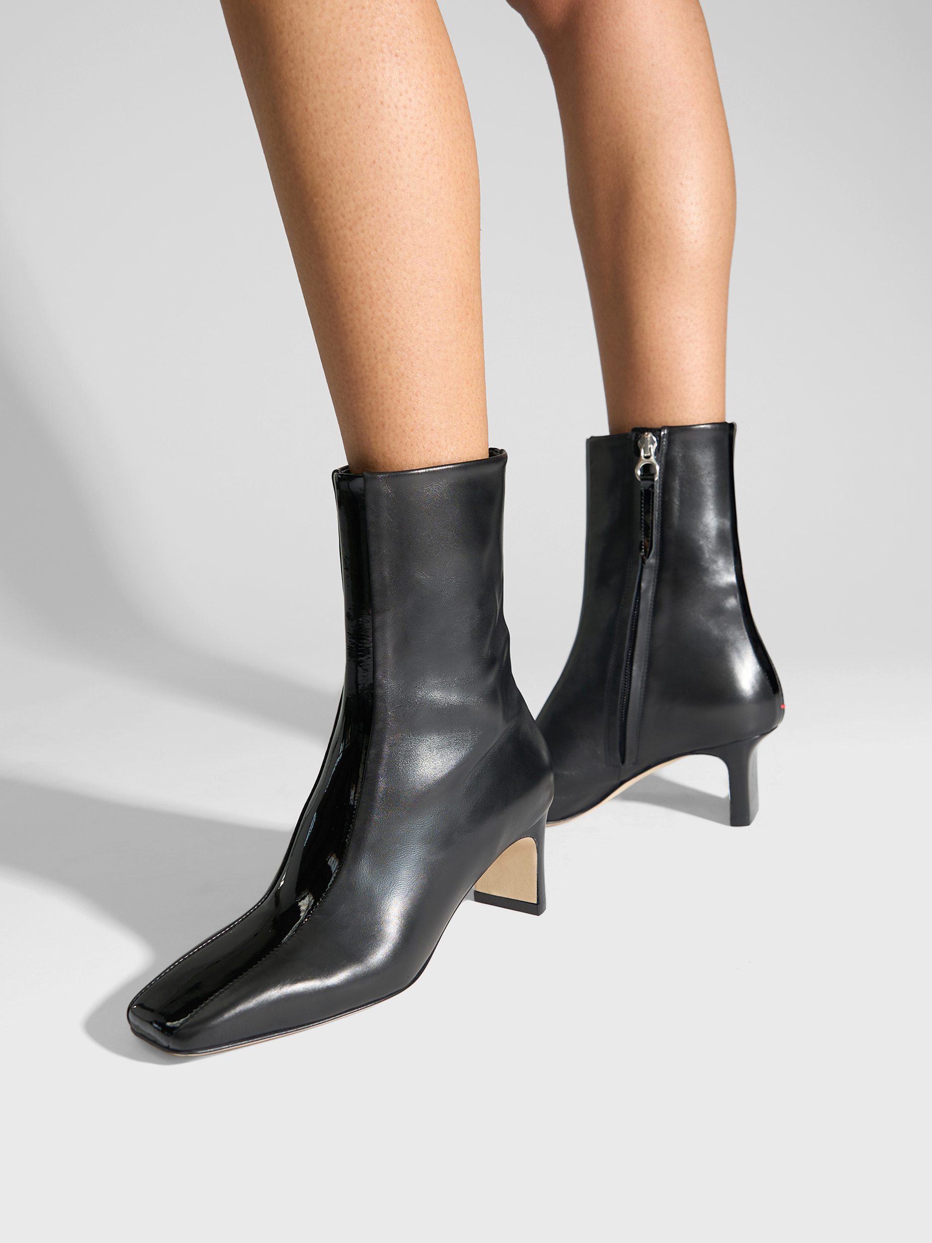 Aeyde | Billie Stripe Leather Ankle Boots for Women | Black Calf/Patent | Square Toe | Mid Heel | On Feet