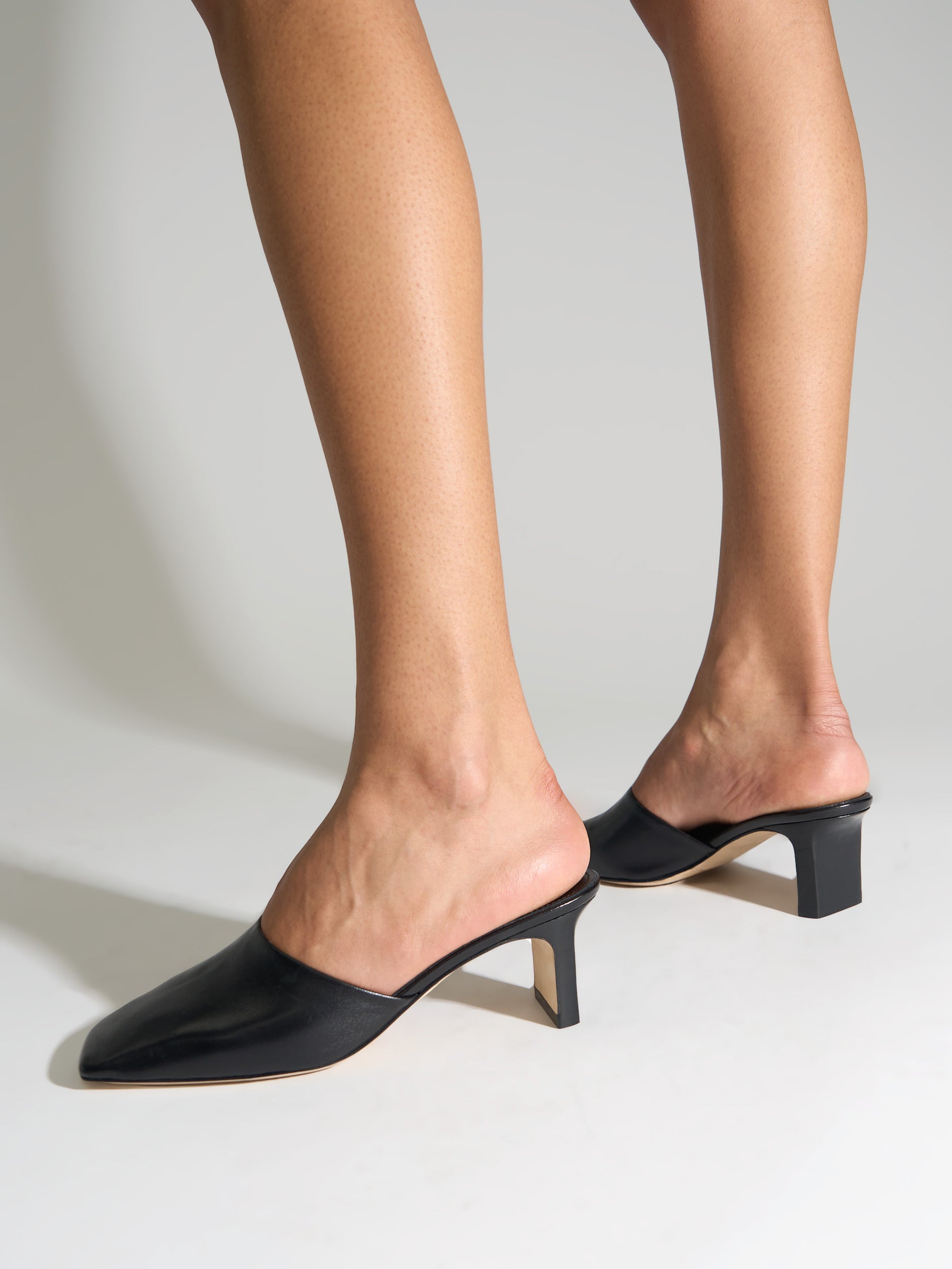 Aeyde | Blithe Square-Toe Mules Leather Pumps for Women | Black Nappa | Square Toe | Mid Heel | On Feet