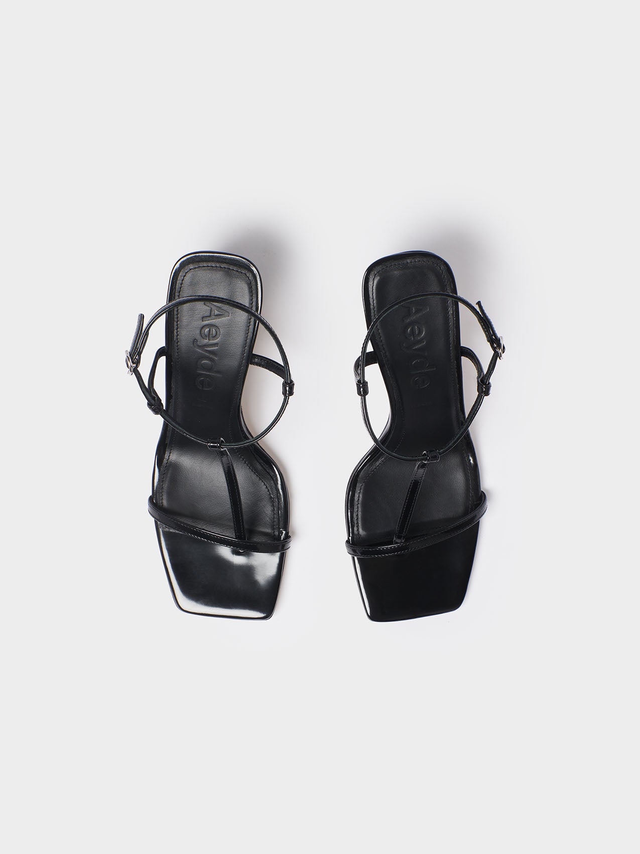 Aeyde | Hilma Leather T-Bar Sandals Leather Heeled Sandals for Women | Black Polido | Square Toe | Mid Heel | Heel Details