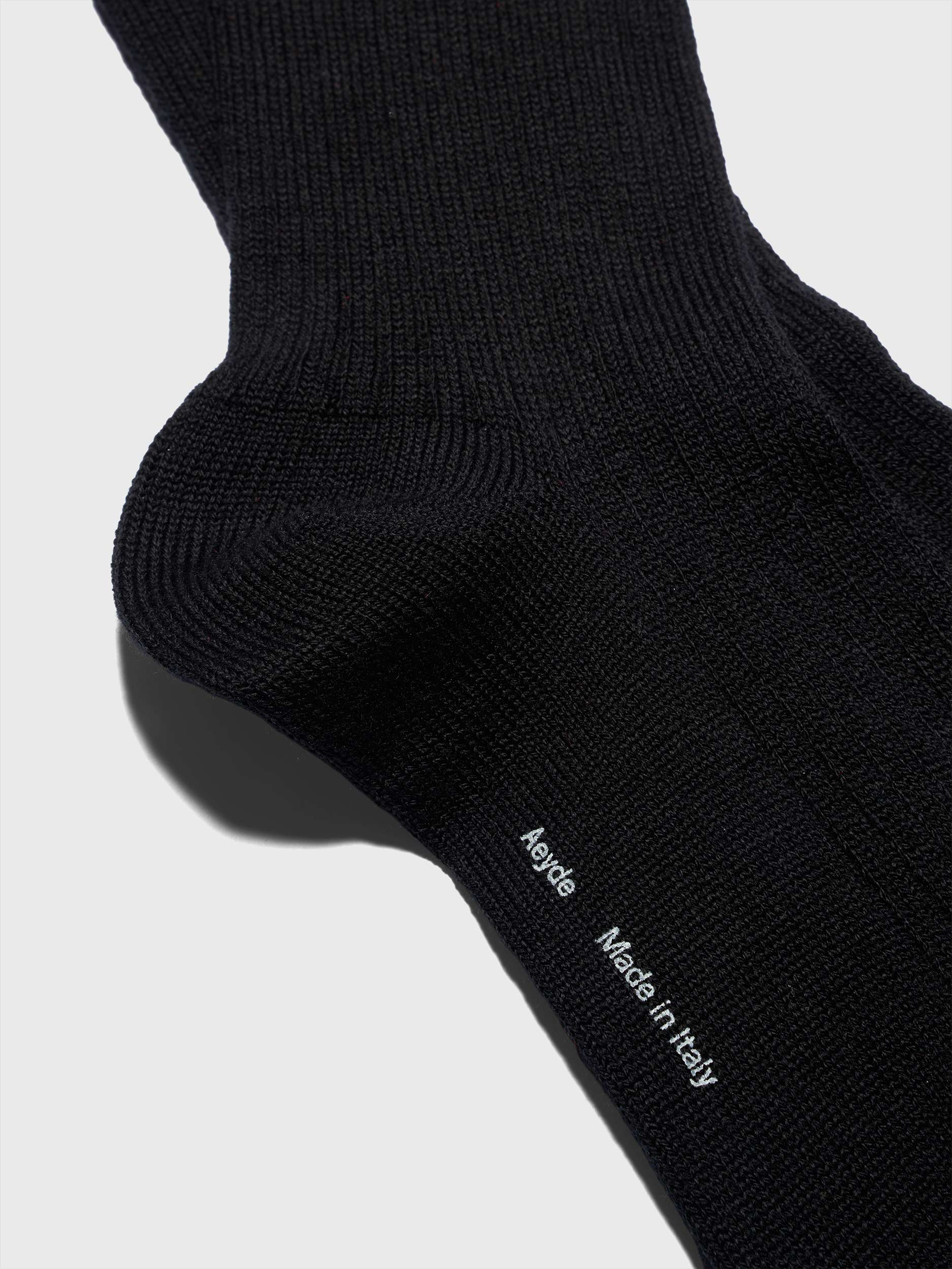 Aeyde | Jonah Wool Socks for Women | Black Wool | Luxury Materials | Handmade in Italy | Material Details