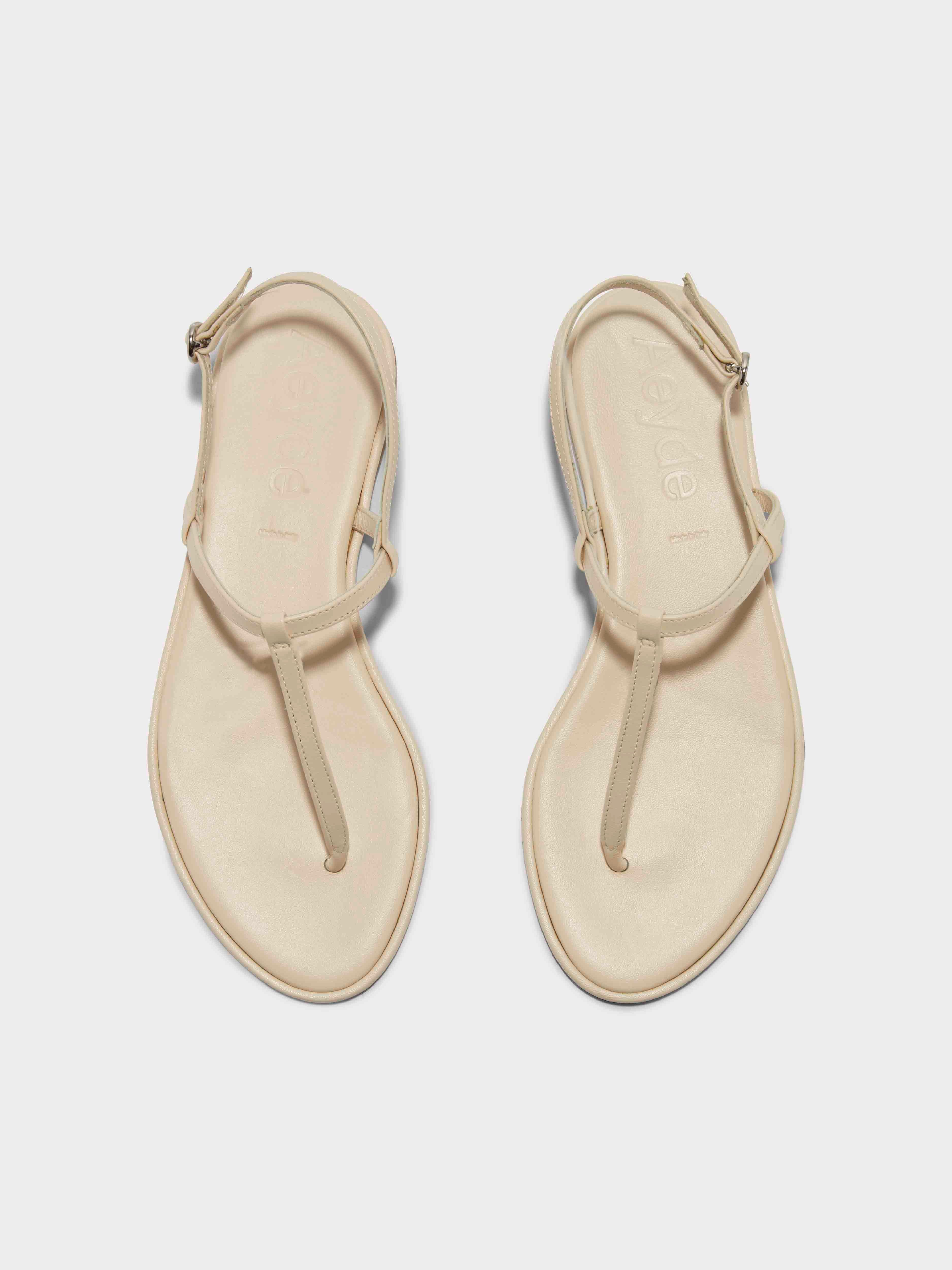 Aeyde | Nala T-Bar Sandals Leather Flat Sandals for Women | Creamy Nappa | Round Toe | Flat Heel | Front View