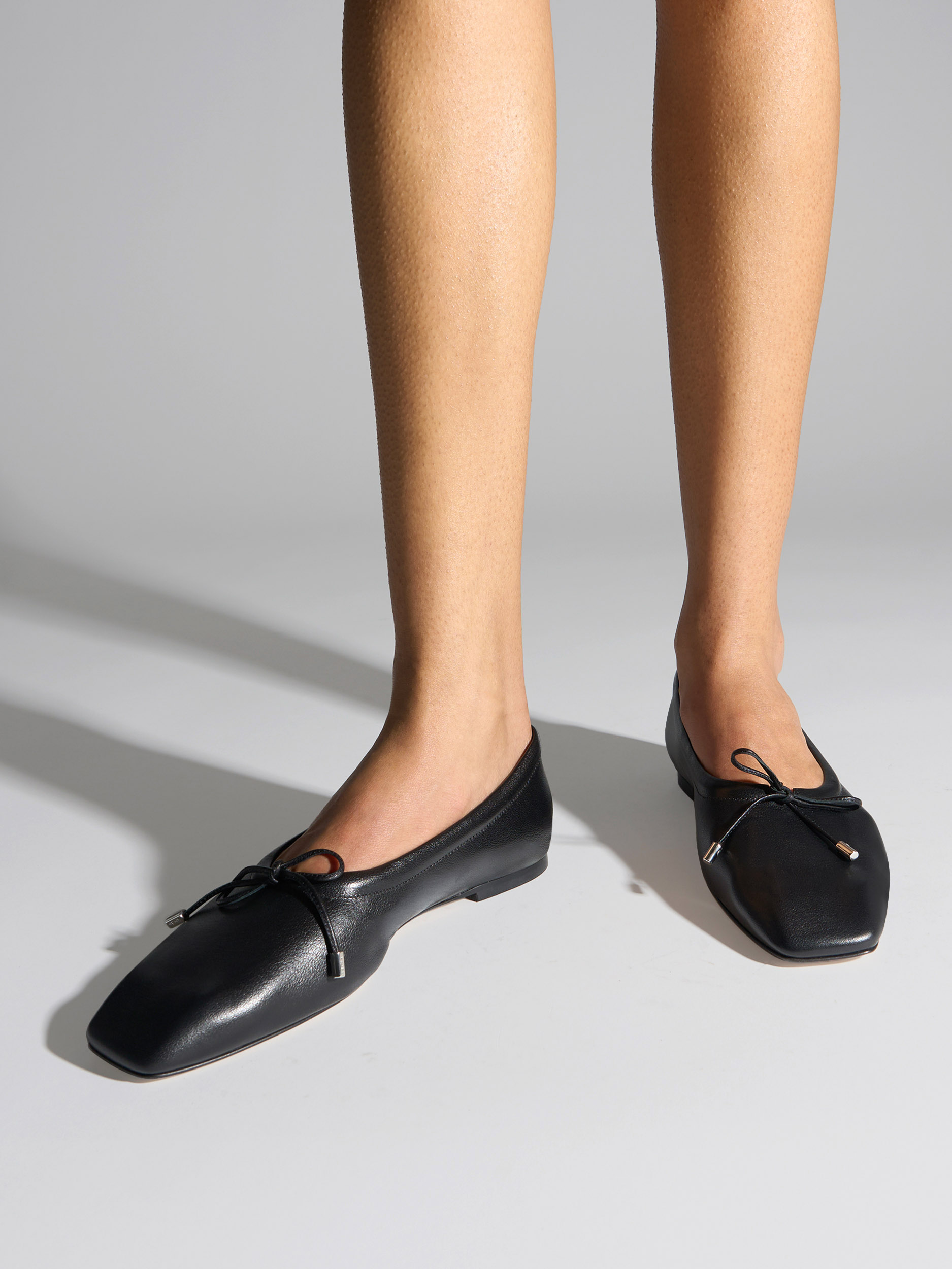 Aeyde | Nomi Glove-Fit Flats Leather Flats for Women | Black Lambskin | Square Toe | Flat Heel | On Feet